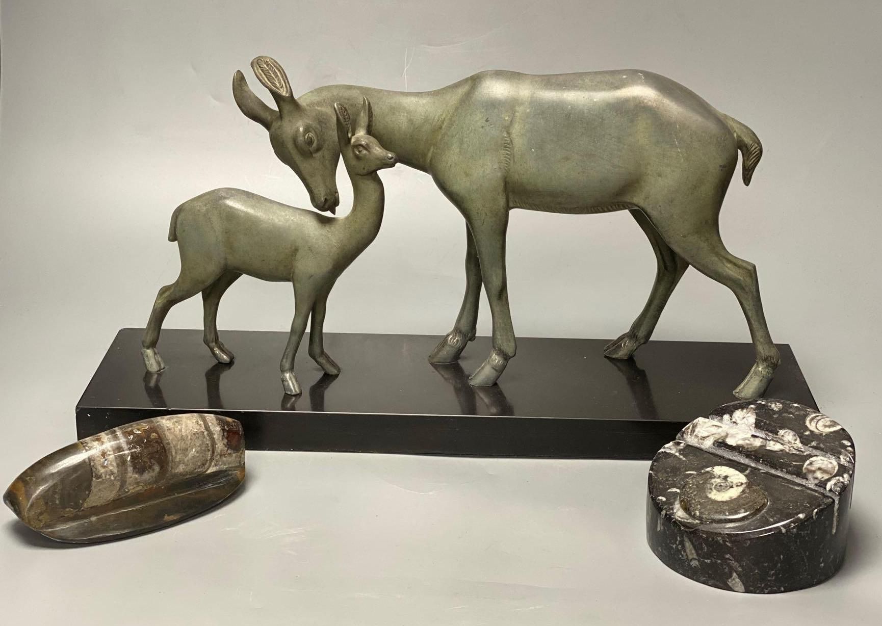 An Art Deco-style spelter deer group on slate plinth, 45cm, a mineral menu holder and a further mineral ornament